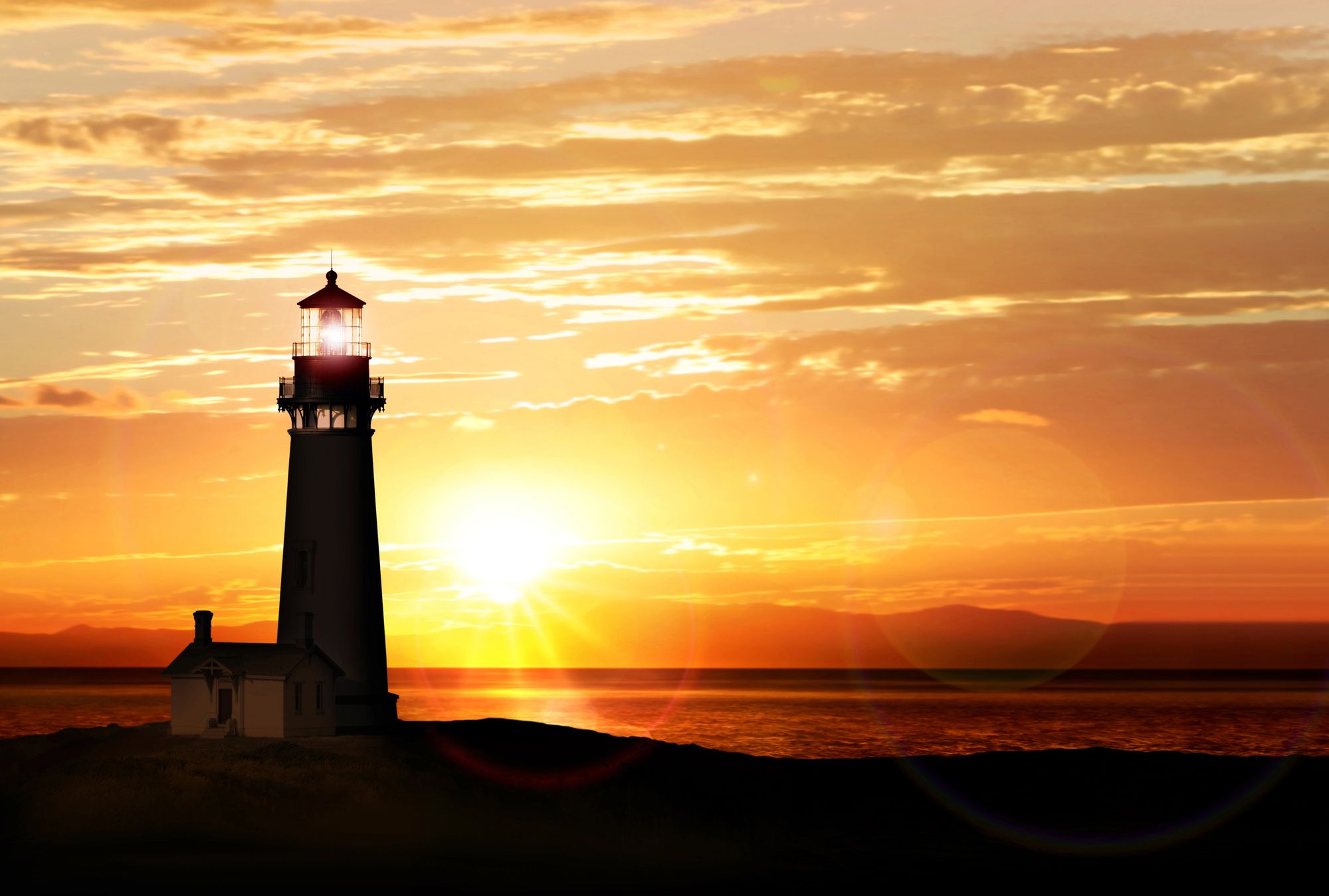 A lighthouse shines over the sea at sunset, under a golden sky.